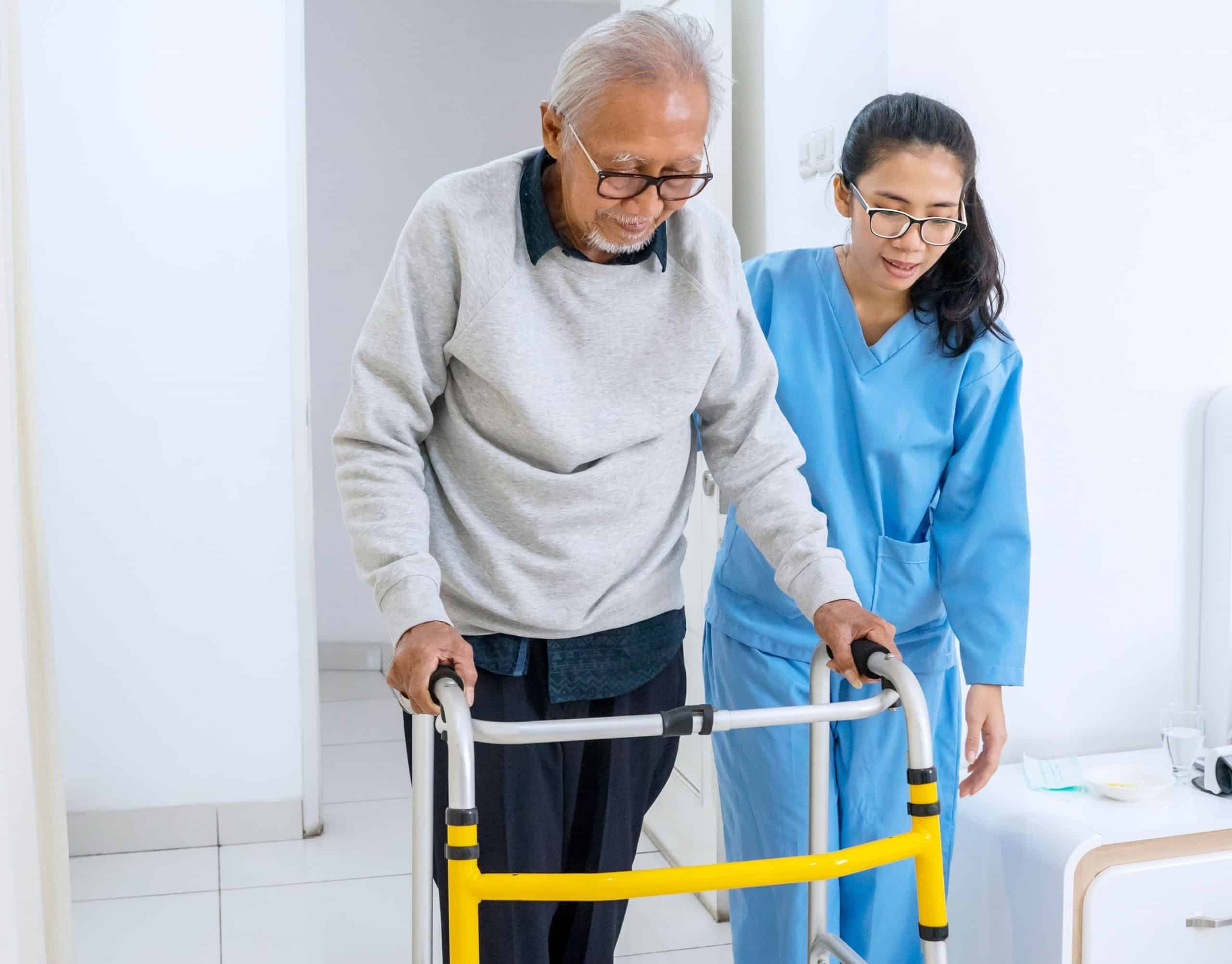 Patient Care Technician with Patient stock image